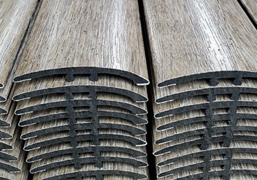 Stack of wood laminate moulding.